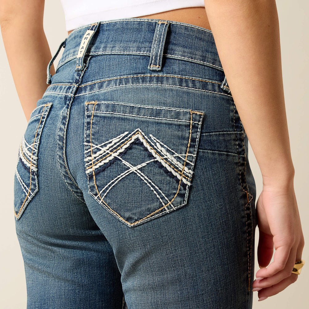 R.E.A.L. Mid Rise Stretch Whipstitch Boot Cut Jean